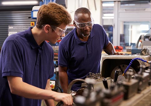 2 workers talking about behavior based safety first